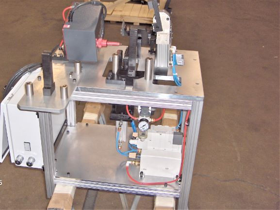 pneumatic actuation check fixture custom designed built integrated quick check high volume electrical buildout hmi plc data collection