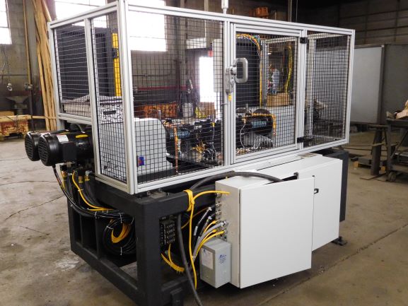 riveting machine guarding electrical custom designed built integrated machinery hmi plc safety circuit light curtains pneumatic actuation part sensing