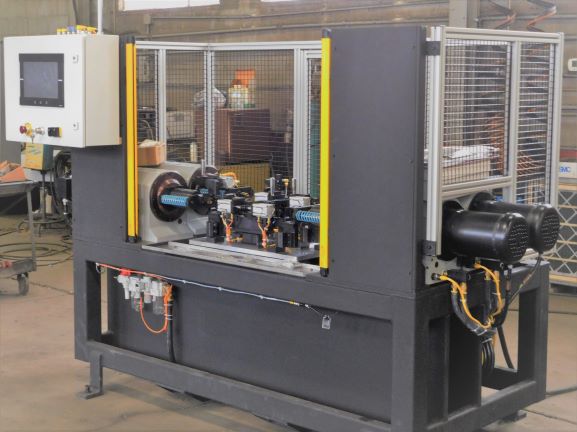 standalone rivet machine custom fabrication design build integrate on-site custom machine quick cycle time automotive application